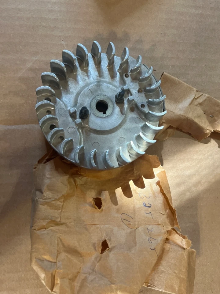 NOS oem partner vintage chainsaw flywheel 505 325265 nos chainsaw c62 - Image 1 of 1