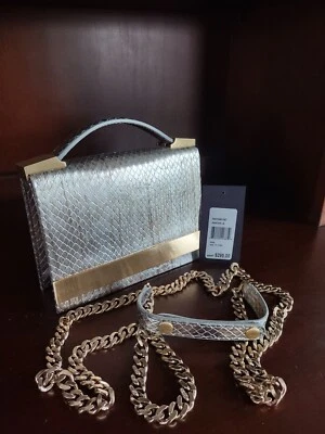 Bolso Brian Atwood "Ava" Plateado Peltre Cuero y Oro Herrajes Correa Gruesa Çhain Foto 1 de 4