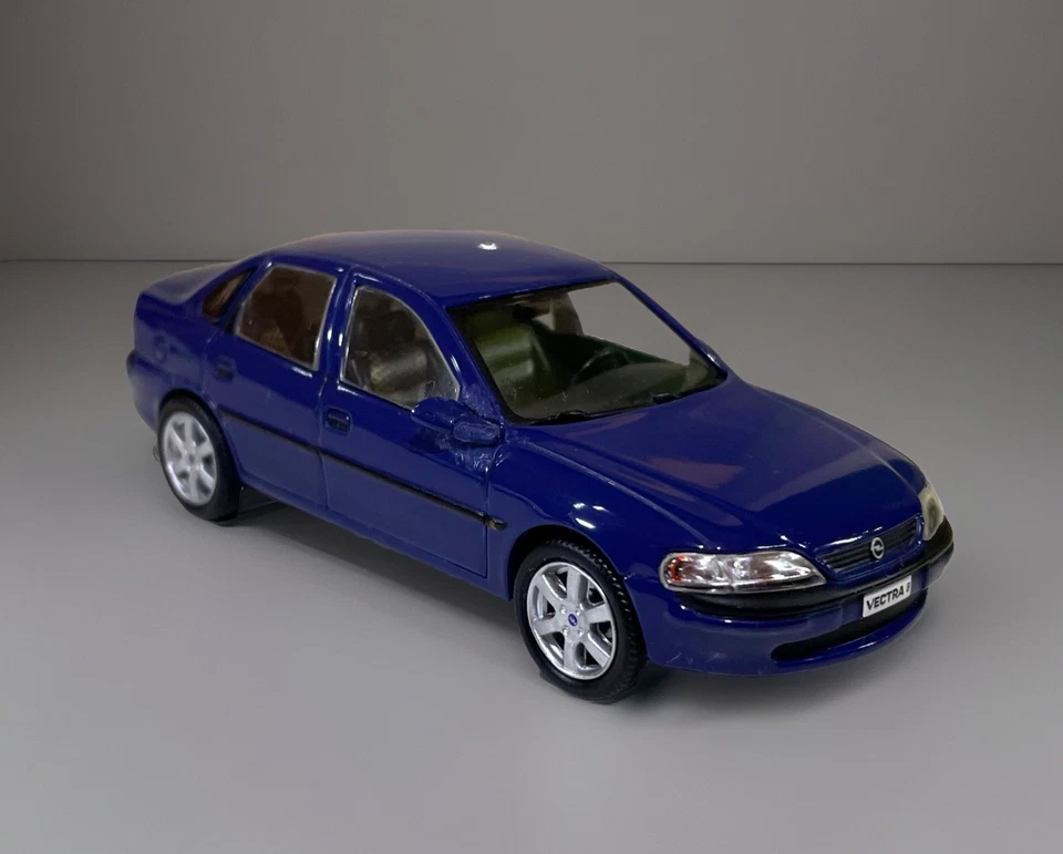 Opel Vectra B Modellauto IXO 1:43  Opel Sport Sportfelgen Blau - Bild 1 von 4