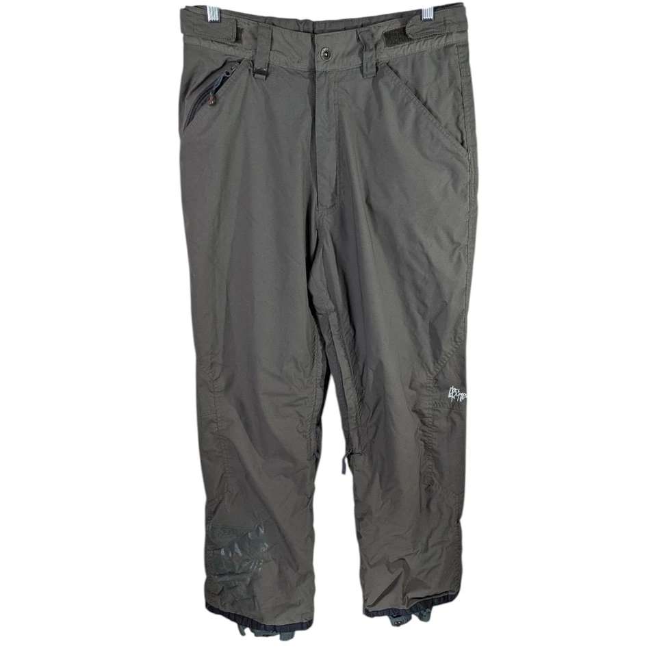 Pantalones de snowboard marrón oliva para hombre caparazón mediano serie ONeill Freedom impermeables Foto 1 de 4