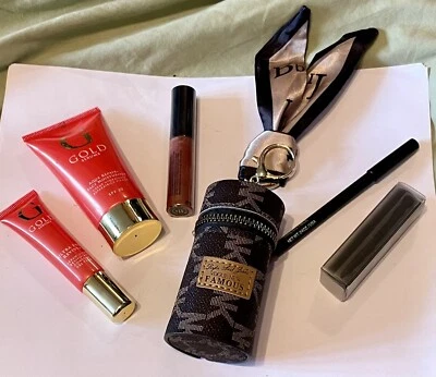 Designer Keychain Small Purse With New Unused Makeup, Skin Care Products - Image 1 of 4