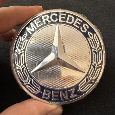 Оригинальные центральные черные/хромированные колпаки ступицы колеса Mercedes Benz 4 x 75 мм с эмблемой - Изображение 1 из 4
