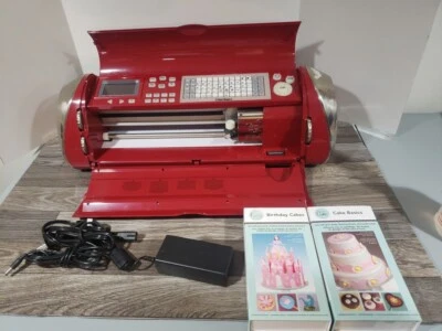 CRICUT CAKE -Electronic Cake Decorating Cutting Machine -Red CCA001 + Cartridges - Image 1 of 3