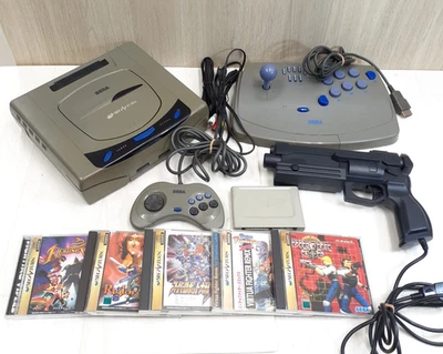 SEGA SATURN Gray console with Virtua Gun, Virtua Stick, 5 games & memory Japan - Image 1 of 4
