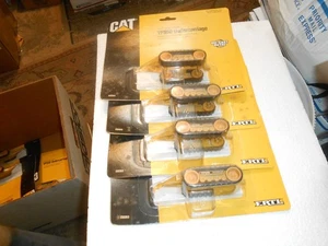 LOT OF 4 ERTL CAT VFS50 UNDERCARRIAGES 1/64 SCALE - Picture 1 of 2
