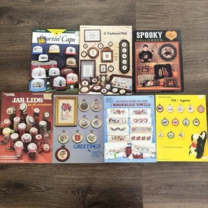 Lot of 7 Vintage Cross Stitch Pattern Leaflets Towels Jar Lids Caps Pets Holiday - Picture 1 of 8