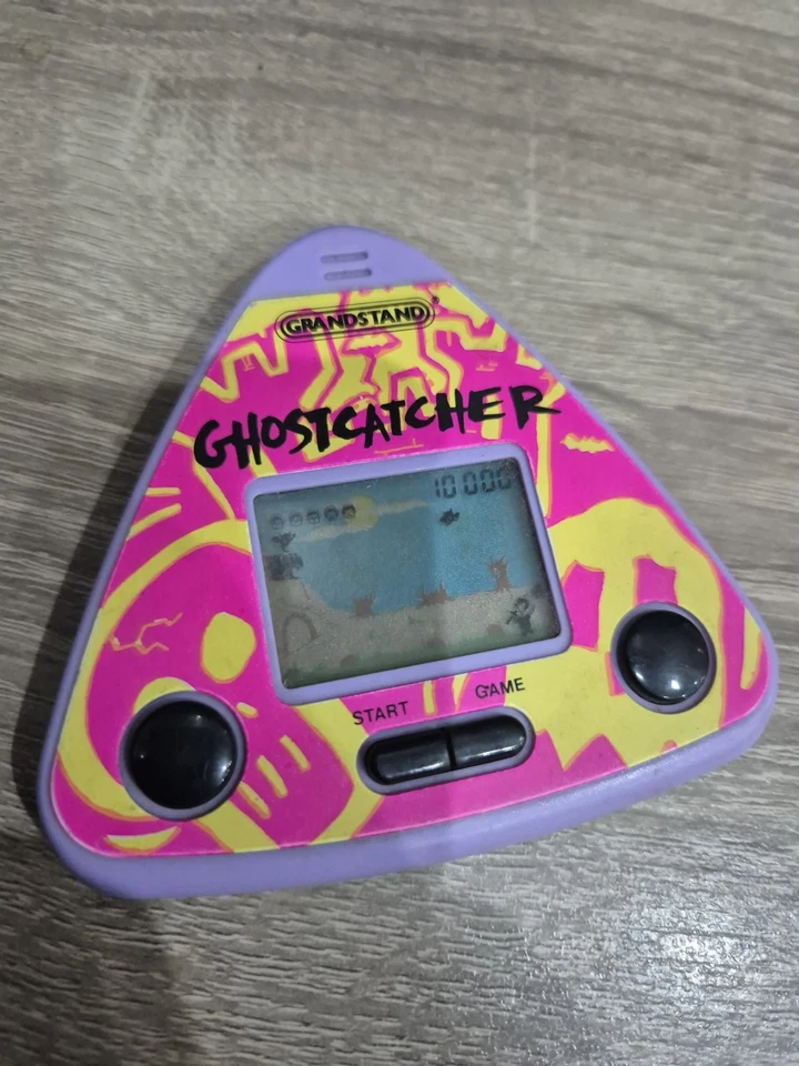 VINTAGE GRANDSTAND GHOSTCATCHER LCD HANDHELD VIDEO GAME 1992 TESTED & WORKING  - Image 1 of 4