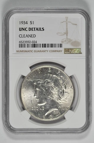 1934 $1 Silver Peace Dollar NGC UNC Details Cleaned Cover