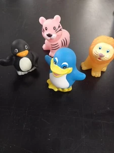LOTTO 4 ANIMALI GOMMA PINGUINO LEONE TIGRE - Foto 1 di 1