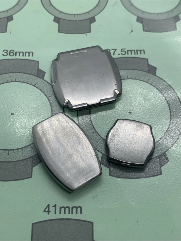 Lote de 3 respaldos de caja de reloj mecánico vintage Waltham, ancla, art déco Foto 1 de 4