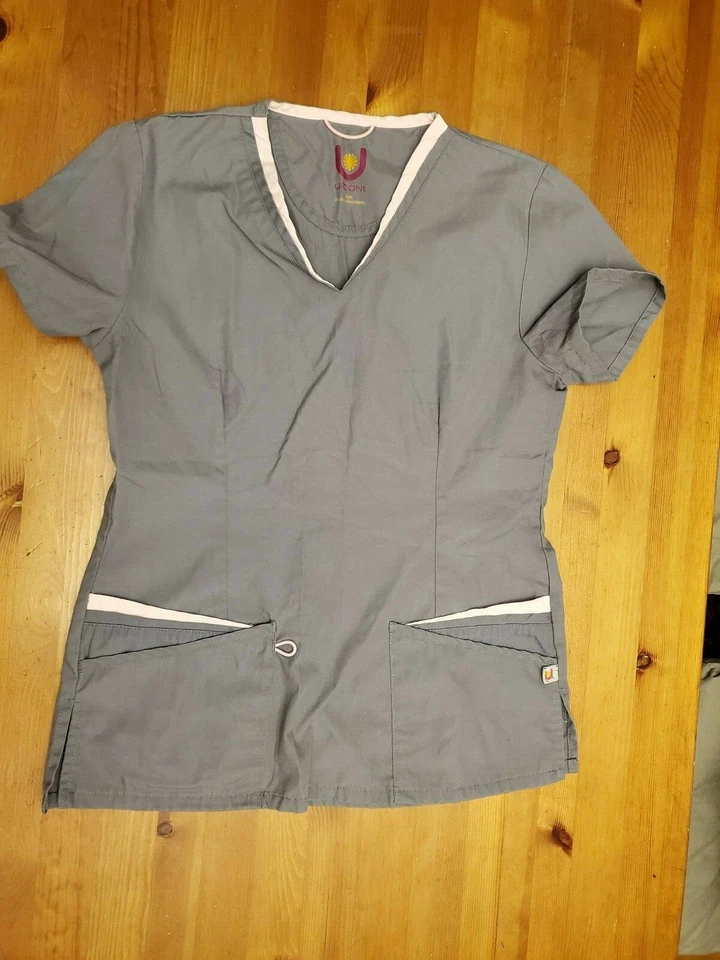 TOP EXFOLIANTE URBANO GRIS CON ACENTO ROSA TALLA XSM Foto 1 de 4