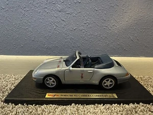 Maisto 1/18 1994 Porsche 911 Carrera Cabriolet Silber Neu - Bild 1 von 2