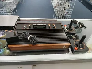Atari 2600 Video Computer Game System Woodgrain Bundle W/ Games And Controllers - Picture 1 of 7