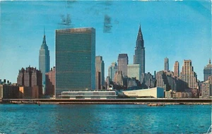 Manhattan Skyline view from East River NYC New York NY pm 1969 Postcard - Picture 1 of 2