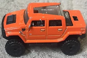 Hummer H2 naranja negro cromado Malasia Hot Wheels - Imagen 1 de 6