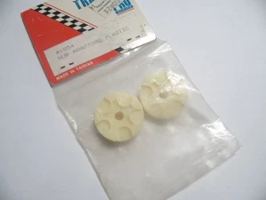 VINTAGE TRAXXAS 1854 Hub Adaptors Plastic - Picture 1 of 1