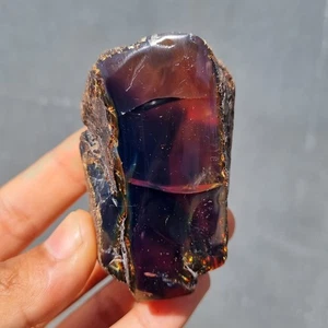 63 gr Ambra Sumatra originale grezza bluastra nera - Ambra Sumatra semilucida - Foto 1 di 6