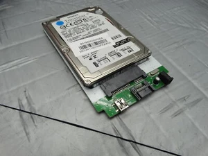 Hitachi Travelstar 60GB Internal 4200RPM 2.5" (IC25N060ATMR040) + SATA Tray - Picture 1 of 8