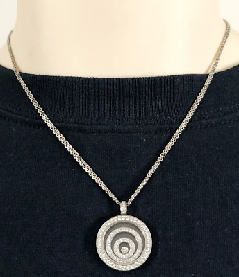 Colgante y collar vintage Chopard Happy Spirit de oro blanco de 18 quilates y diamantes 19,5 g Foto 1 de 4