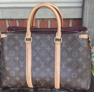 Cartera Louis Vuitton para mujer con monograma talla mediana ligeramente usada Foto 1 de 4