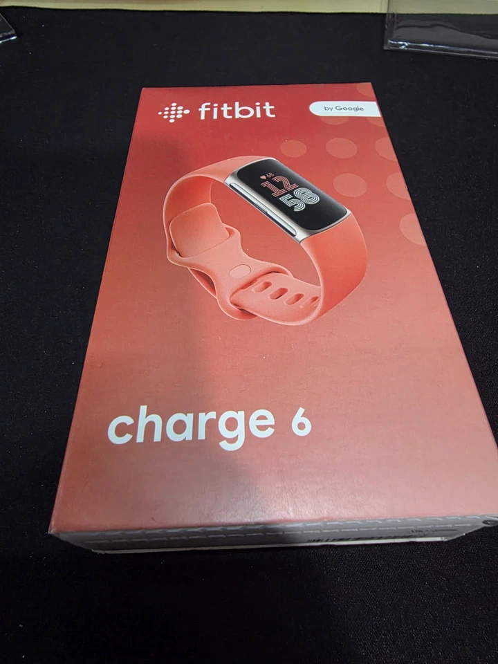 Fitbit Charge 6 Activity and Fitness Tracker - Red Coral Champagne Gold Band - Image 1 of 1