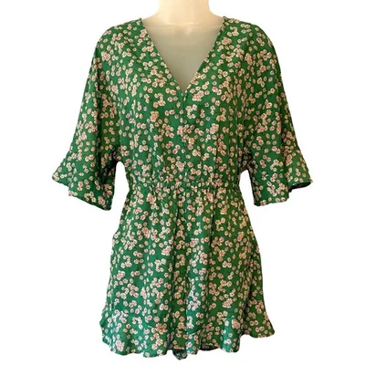 Exuberante mameluco para mujer verde floral con volantes dobladillo ojo de cerradura espalda abierta talla pequeña Foto 1 de 4