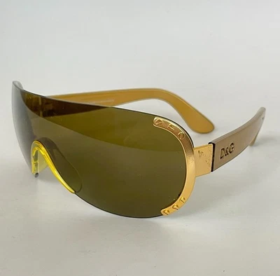 Óculos de sol Dolce Gabbana G&B Wrap Around Shield marrom dourado vintage anos 90  - Imagem 1 de 4
