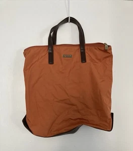 Mini Bolso Tumi Naranja - Imagen 1 de 10