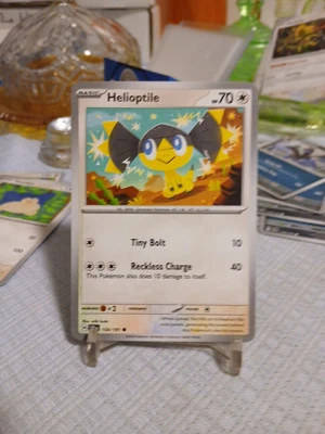 Pokémon-NM-SV08: Surging Sparks-Helioptile-154/191 - Image 1 of 2