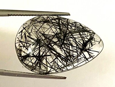 EGL USA Tourmalinated Quartz Pear Shape Cabochon Colorless With Black Inclusions - Image 1 of 4