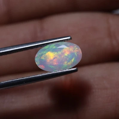 1.6 Cts 11.5x7.1 MM Natural AAA Flashy Multi Fire Ethiopian Opal Faceted Oval - Image 1 of 4
