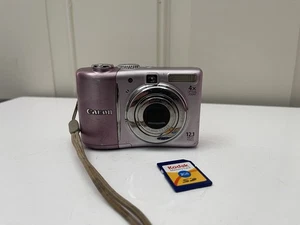 Canon PowerShot A1100 IS 12.1 MP Digital Camera Rare Pink - READ Poor Cosmetic - Picture 1 of 15