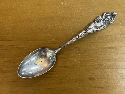 Cuchara de recuerdo de plata esterlina rara Reed Barton amor desarmado Foto 1 de 4