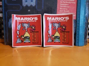 Nintendo Mario's Zementfabrik Spiel und wa Watch Side Art Aufkleber. Neu. - Bild 1 von 1
