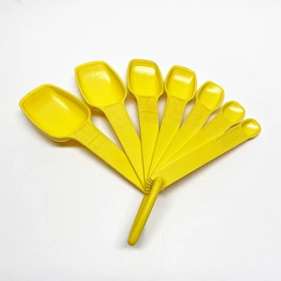 Vintage 1970s Tupperware Yellow Plastic Measuring Spoons - Set of 7 - Image 1 of 4