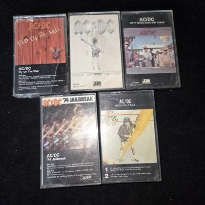 Lot 5 AC/DC Cassette High Voltage Jailbreak Dirty Deeds Flick Switch Fly Wall - Image 1 of 4