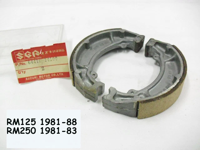 Suzuki RM125 RM250 Rear Brake Shoe NOS RM Genuine BRAKE SHOE SET 64410-14100 Foto 1 de 1