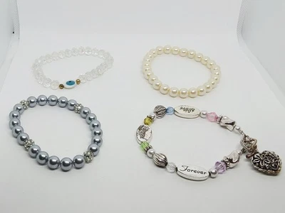 Konvolut 4 Armband Perlen Rinstein Holz Schmuck - Bild 1 von 4