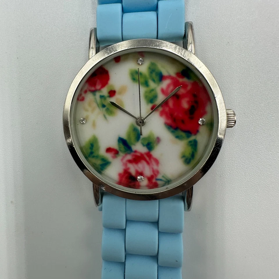 Relógio Geneva Feminino Tom Prata Mostrador Floral Pulseira de Silicone Azul Nova Bateria 9" - Imagem 1 de 4