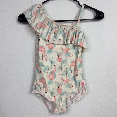 Traje de baño con volantes Butts para niñas 7 rosa flamenco un hombro con volantes playa una pieza Foto 1 de 4