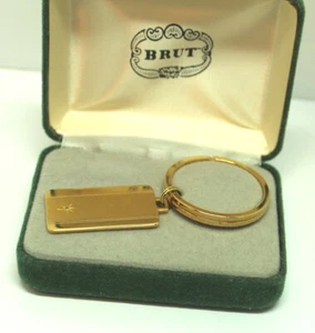 Unused Brut Key Fob, Gold colored, small imbedded gem, Made in USA - Picture 1 of 3