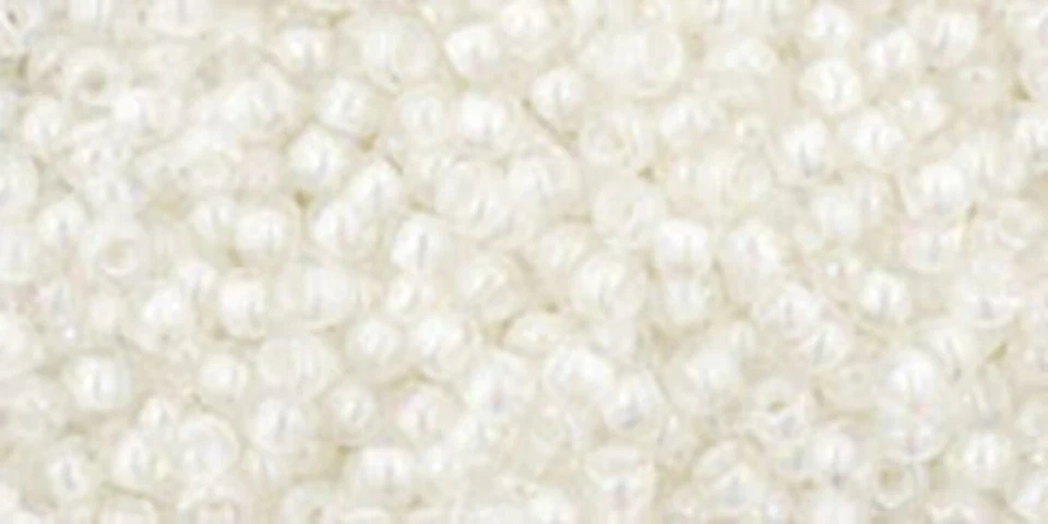 11/0, Toho Seeds, #777, color interior CRISTAL ARCO IRIS/forrado en crema, 10 g, TR-11-401 Foto 1 de 1