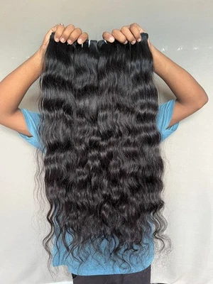 Paquetes de cabello humano ondulado crudo indio - 100 % virgen, puede teñirse hasta 613 rubios Foto 1 de 3