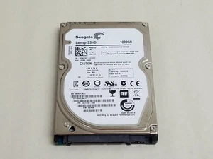 Seagate ST1000LM014 1 TB 2.5" SATA III Hybrid Laptop SSHD - Picture 1 of 3