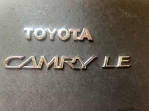 2002 - 2007 Toyota Camry LE Emblem Logo OEM - Picture 1 of 2