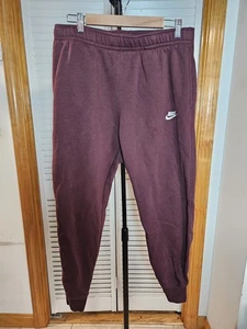 Pantalones deportivos Nike de vellón talla L rojo baya para hombre club deportivo - Imagen 1 de 5
