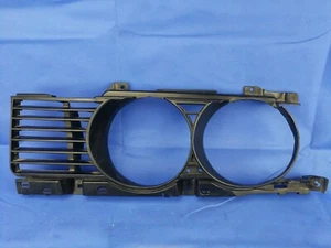 Parrilla de faros original BMW Serie 5 e34 lado izquierdo del conductor 1988/1993 - Imagen 1 de 6