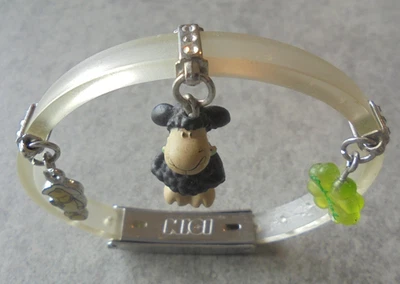 NICI Armreifen Schmuck mit Verzierungen weiß/silberfarbend Motiv Schafe Nr.4073 - Bild 1 von 4