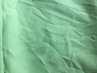 Green rayon blend fabric 60 wide by 1 yard 28“ - Image 1 of 4