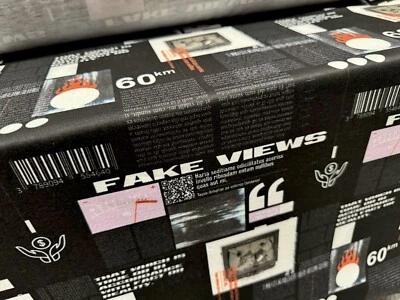 Soft Handle Stretch Jersey Fabric, Per Metre - Fake Views Headline Print - Image 1 of 3